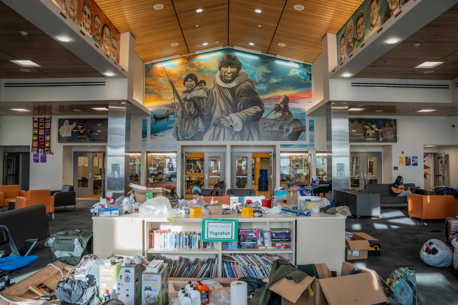 Emergency supplies fill the lobby of the Chief Paul Memorial School in Kipnuk, Alaska. Nearly 700 people sheltered there for two days after ex-Typhoon Halong.